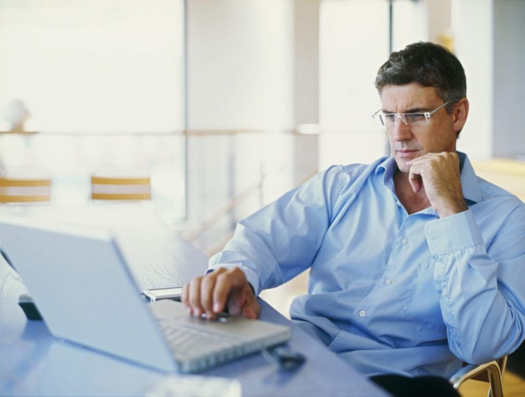 Man On Computer 1030X780 1 - Fms Franchise Marketing Systems