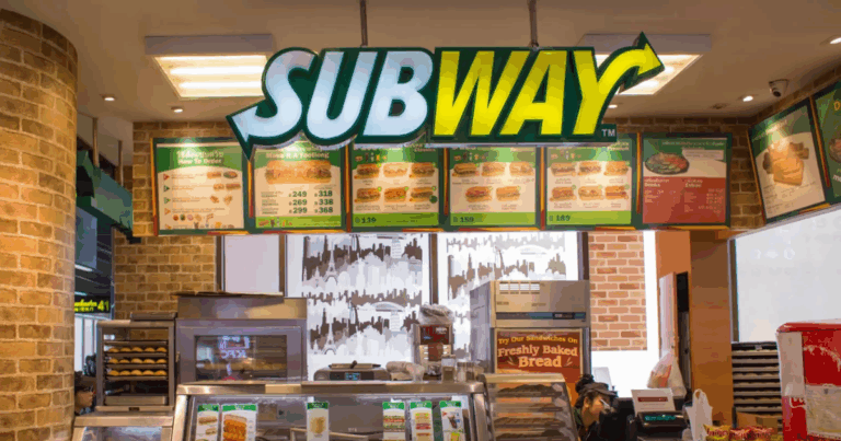 Interior of a Subway franchise location showing menu boards and ordering counter - franchise advantages illustrated through standardized branding.