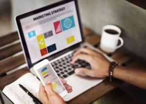 Marketing professional analyzes data and optimizes franchise marketing campaigns across digital platforms, tracking engagement metrics