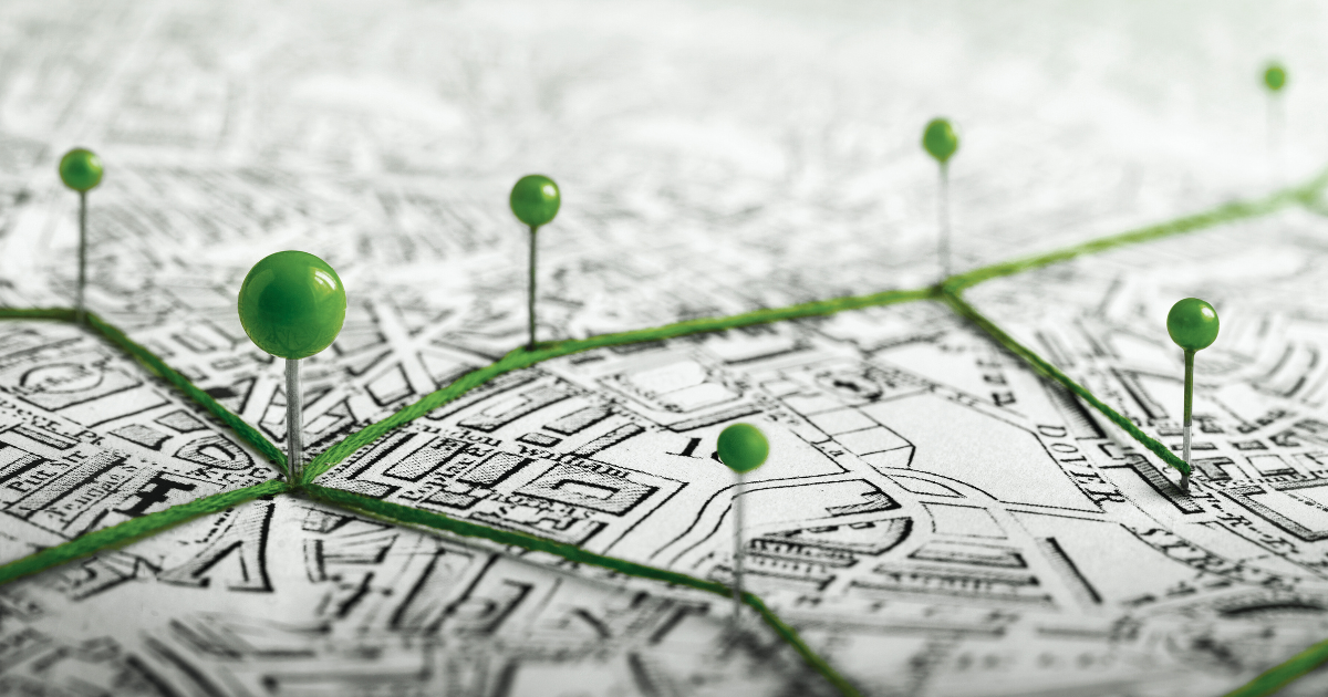 Visual map with connected green pins representing multi-location growth and why brand consistency is so important.