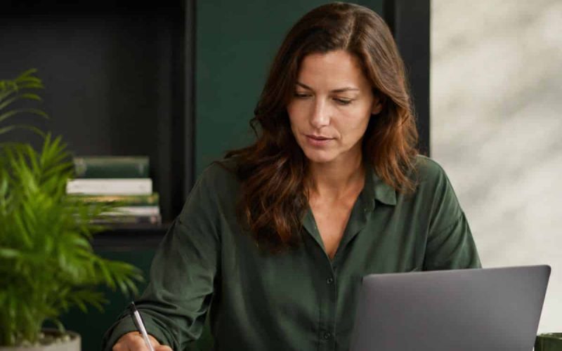 Founder reviewing steps to franchise a business with a franchise development plan